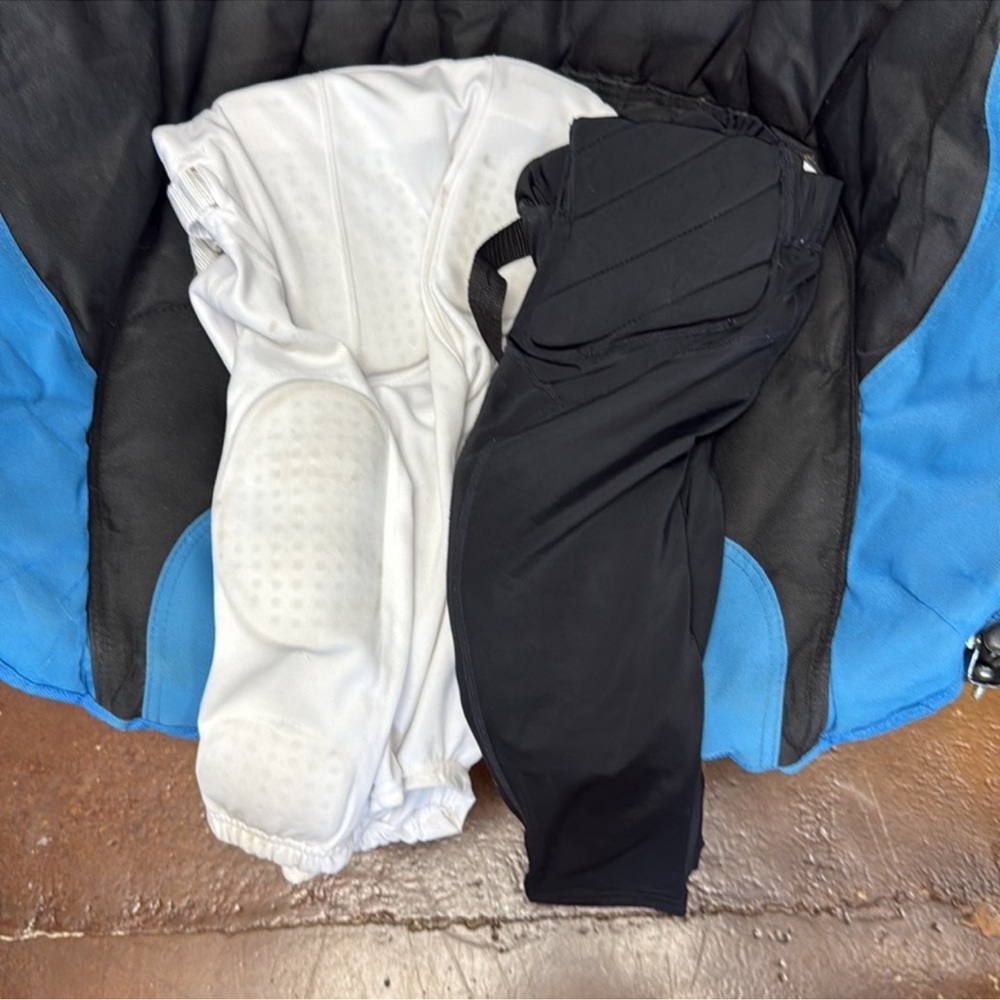 Two pairs of boys football pants size small